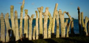 Saint-Maurice beach showcases a veritable open-air museum of exquisitely carved indigenous Kanak totem poles, Île-des-Pins, New Caledonia